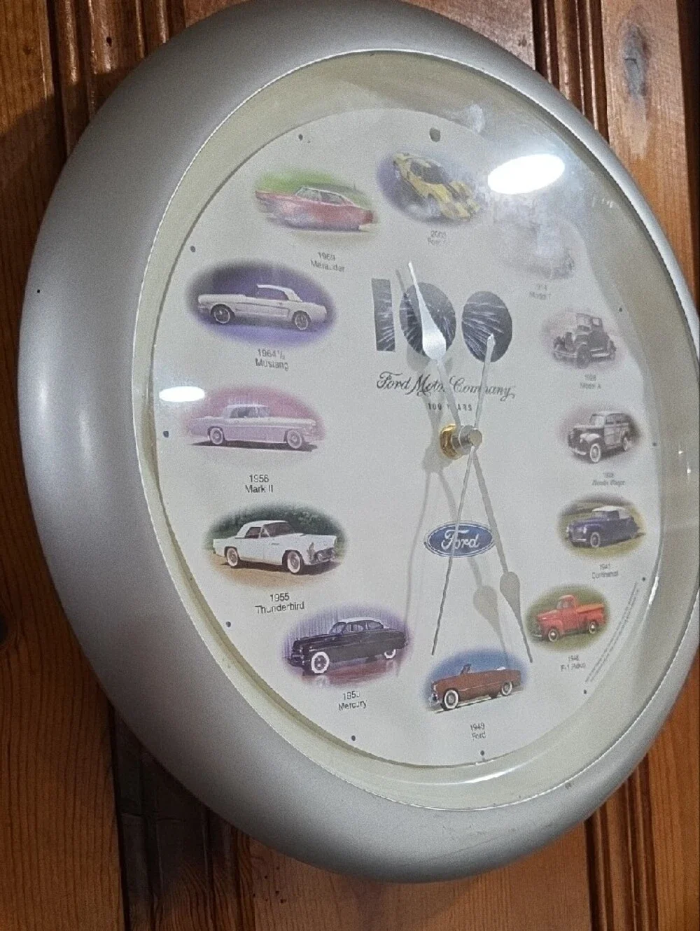 Ford Silver Anniversary Wall Clock with Multicolored Car Illustrations